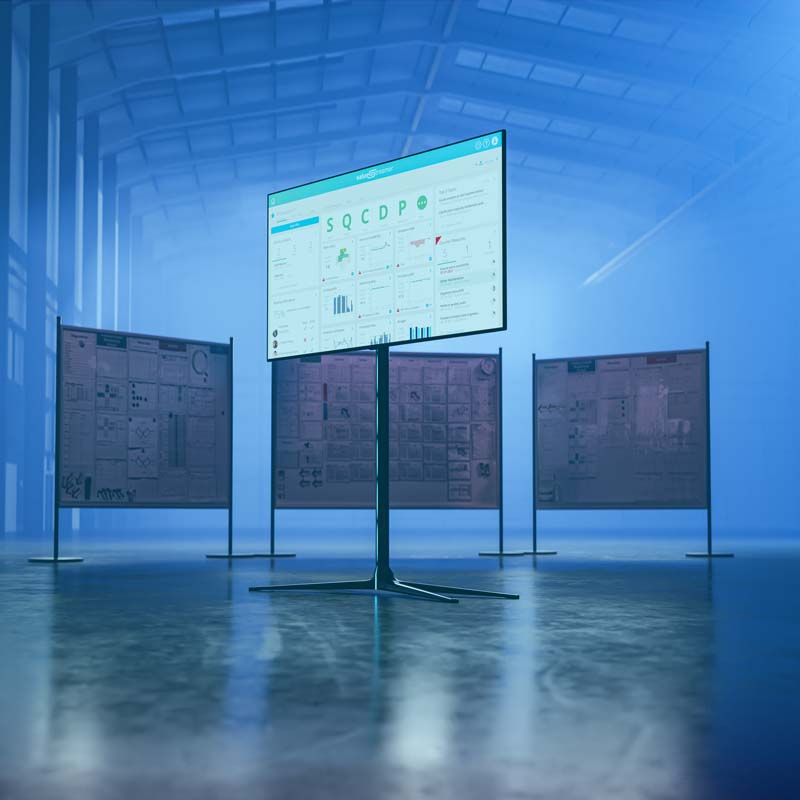 Image of webinar Digitizing Shopfloor Management: ValueStreamer's digital shopfloor board stands in front of analog Shop Floor boards